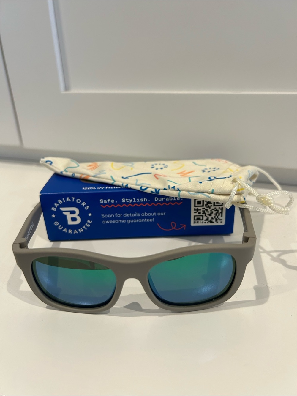 Babiators Matte Grey Kids Sunglasses with Blue-Green Mirrored Lenses